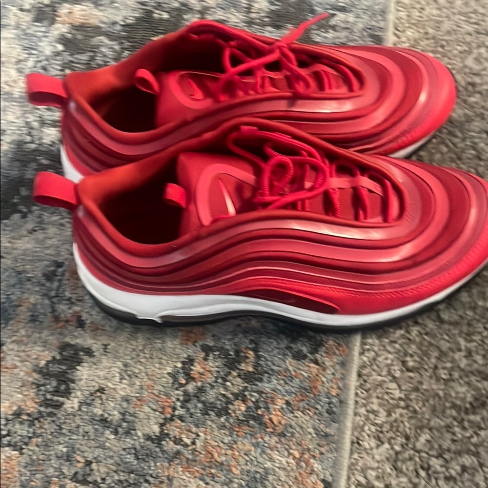 Nike Red Sneakers with Cushioned Sole and Mesh Upper